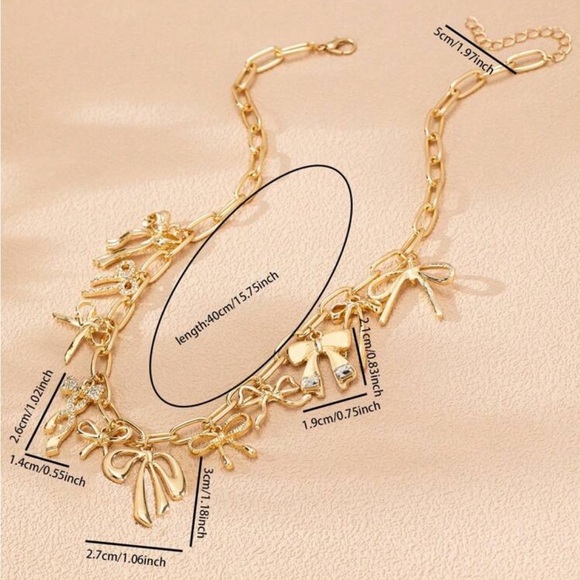 Chain bow charm link gold necklace - Picture 2 of 3